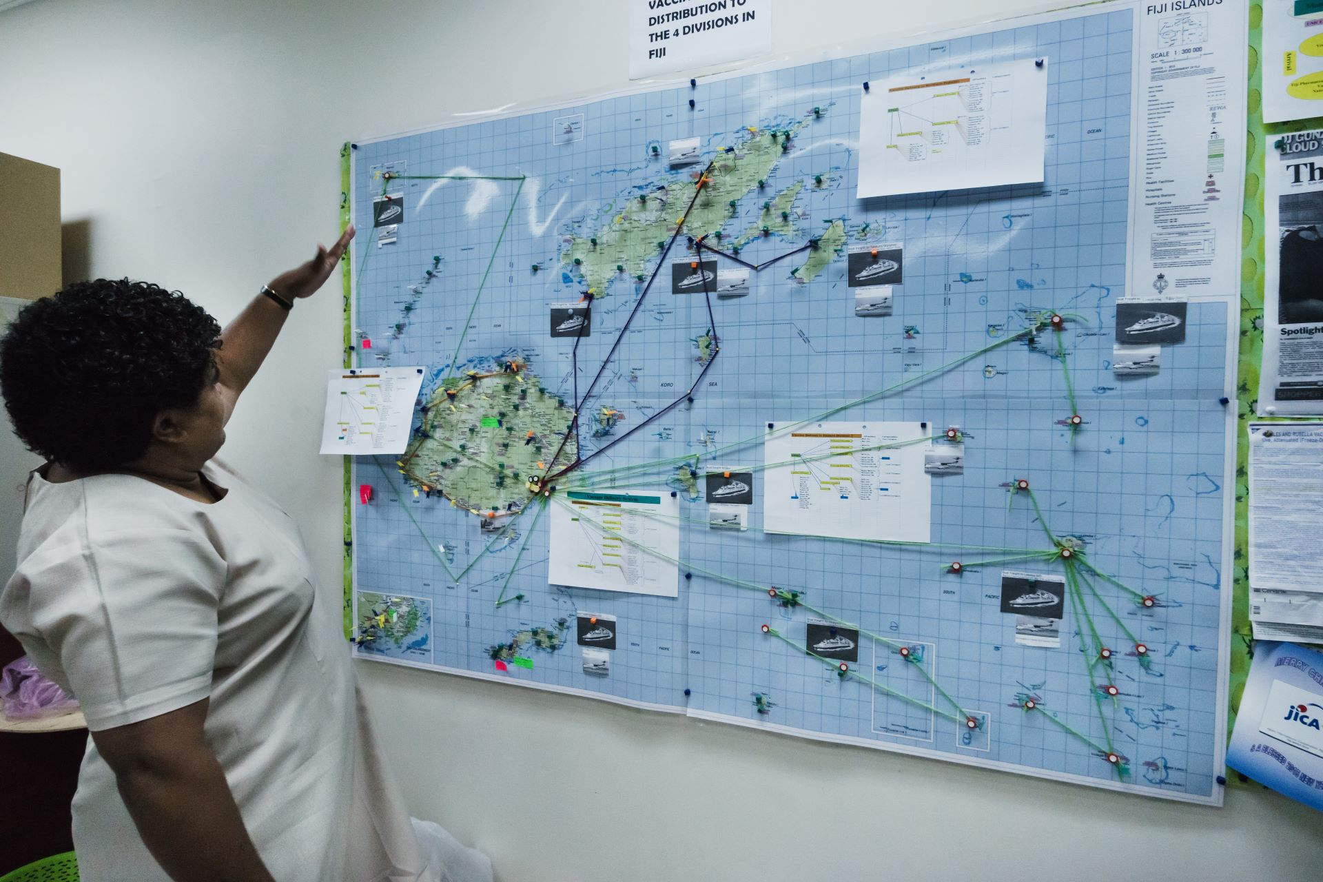 A health worker map to distribute vaccinations in Suva Map of vaccine distribution system at a cold chain facility in Suva.