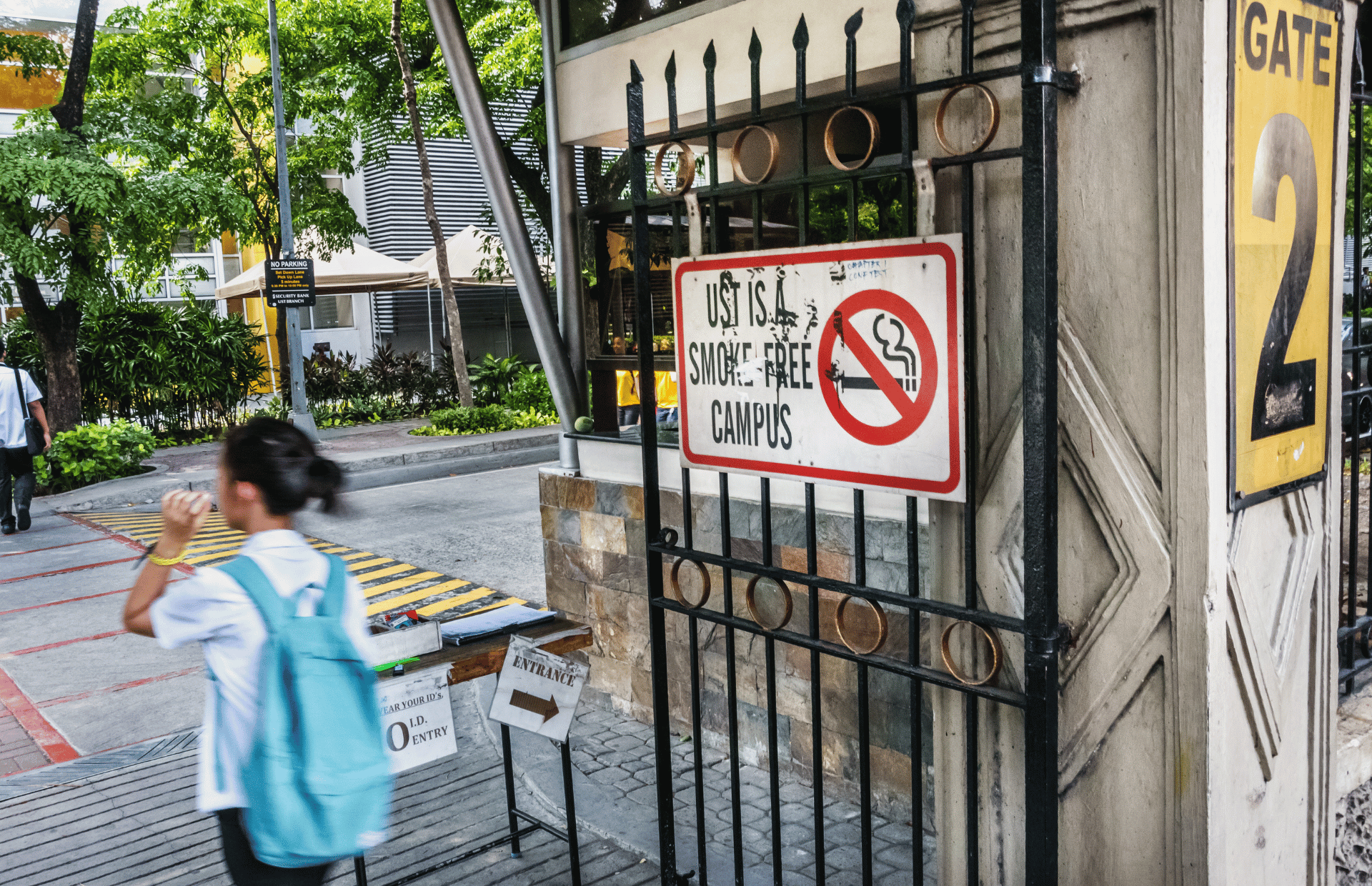 No smoking campus A non-smoking sign in a school campus gate.